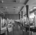 Chairs stacked on tables in the UMD cafeteria