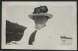 Carrie Eliza Hartley sitting on a canoe on Wolf Lake