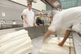 Making cheddar cheese in the Pilot Plant in the Food Science and Nutrition Building, St. Paul campus, University of MInnesota.