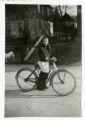Suzon Karon on a bicycle