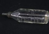 Pyrex glass nursing bottle with rubber nipple