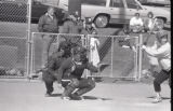 Action shot of UMD 1988 women's softball player catching ball