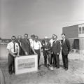 Raymond Darland with a group of people at the groundbreaking for the Library Addition