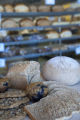 Milling wheat at a small bakery in Maplewood,Minnesota, where breads, muffins, rolls and cookies are baked using Whole grains.