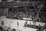 Action shot of UMD 1997 men's basketball team during Fill the Gym event