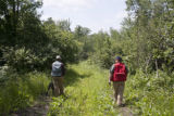 Forestry professor Tom Burk (red vest) and consulting forester on private woodland in Crow Wing County, Minnesota.