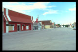 Small town mainstreet, very little business during late 1990s crisis in rural economy. Redwood County, Minnesota