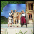 Three actors performing on stage in the 1998 UMD production of "The Betrothed"
