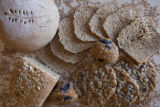 Milling wheat at a small bakery in Maplewood,Minnesota, where breads, muffins, rolls and cookies are baked using Whole grains.
