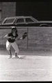 Action shot of UMD 1987 women's softball player catching ball
