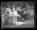 Five members of the University Bird Class eating lunch at Frank Commons' house