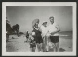 Judith Hartley and Augusta Hopkins standing together with an unidentified adult and child on Miami Beach