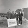Raymond Darland with a group of people at the groundbreaking for the Library Addition