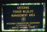 Sign where fishers introduced from Minx have reduced porcupine population.
