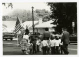 Children marching during the Torah Dedication parade at the Lubavitch Learning Center