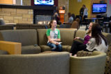 A group of students sitting and talking in Kirby Student Center lounge