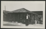 Judith Hartley standing in front of a bungalow in Coronado