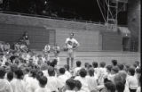 UMD 1993 men's basketball player teaching kids during basketball camp