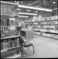 Person sitting at a desk inside the Natural Resource Research Institute