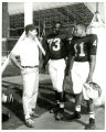 Football Team Members John Williams (#73), Michael Curtis (#41)