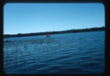 Sailing canoe on lake