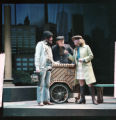 Three actors performing on stage in the 1995 UMD production of "Merrily We Roll Along"