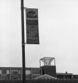 A UMD banner on a light post outside the Campus Center