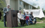 Speaker at dedication ceremony of the newly built Goldfine Apartments