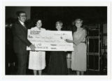 Members of the Mount Sinai Hospital Auxiliary present a check to members of the administration, Minneapolis, Minnesota