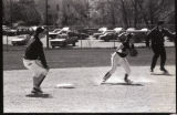Action shot of UMD 1987 women's softball team