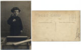 Boy with a hammer and wooden box, Minneapolis, Minnesota