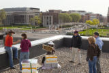 Installing a bee colony on the roof of the Weisman Art Museum, University of MInnesota.