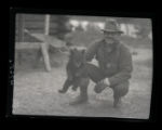 Black bear cub with Bob Grieg