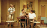 Three actors performing on stage in the 2001 UMD production of "Odd Couple"