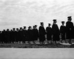 Students in line outdoors for commencement