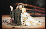 Two actors performing on stage in the 1999 UMD production of "Into the Woods"