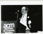 Man Giving Presentation at ACM Annual Meeting (Box 4, Folder 7)