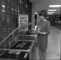 Student next to Dr. Martin Luther King Jr. Memorial in library