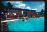 Camper jumps in the pool at Camp Butwin, Eagan, Minnesota