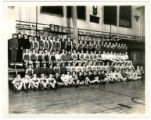 Basketball teams in the gym of the St. Paul YMCA, Minnesota, circa 1925-1935.
