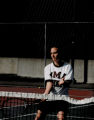 University of Minnesota Duluth women's tennis player Melissa Keavy at the net