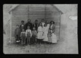 Louis and Ruth Sinykin at the school house with others