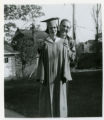 Suzon Karon in graduation robes, with Robert J. Karon