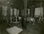 Men and equipment at gymnasium in New York City, 23rd Street branch of the YMCA