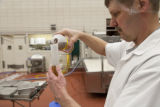 Making cheddar cheese in the Pilot Plant in the Food Science and Nutrition Building, St. Paul campus, University of MInnesota.