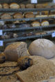 Milling wheat at a small bakery in Maplewood,Minnesota, where breads, muffins, rolls and cookies are baked using Whole grains.