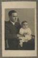 Portrait of Cavour Hartley holding his son John Hartley in his lap