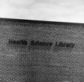 Health Science Library sign on the exterior of the building at UMD