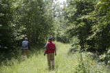 Forestry professor Tom Burk (red vest) and consulting forester on private woodland in Crow Wing County, Minnesota.