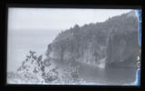 Duck hawk nest and young showing debris, north shore of Lake Superior